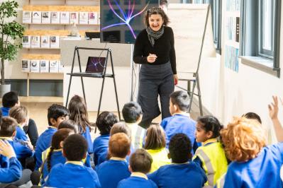 Prof. Ingrid Hess discussing her exhibition with students from Holy Rosary Primary School, Belfast.